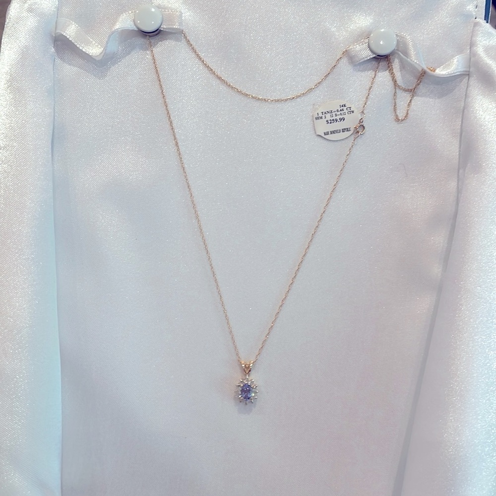 14k yellow gold Tanzanite pendant with diamonds